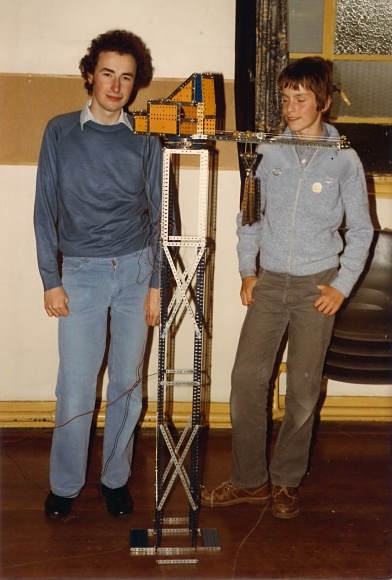 Brian Leach (left) and his tower crane, with junior club member Neil Carter, in 1981