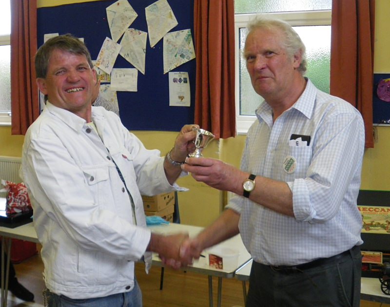 Les Chatfield (left) is presented with the Geoff Carter Cup by Chairman Frank Paine at our meeting on 23rd June 2012