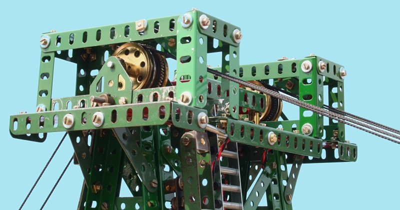 View of the balance cable, head pulleys and winding gear