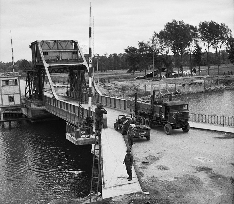 Figure 1: The captured Pegasus Bridge in 1944, with the gliders in the background