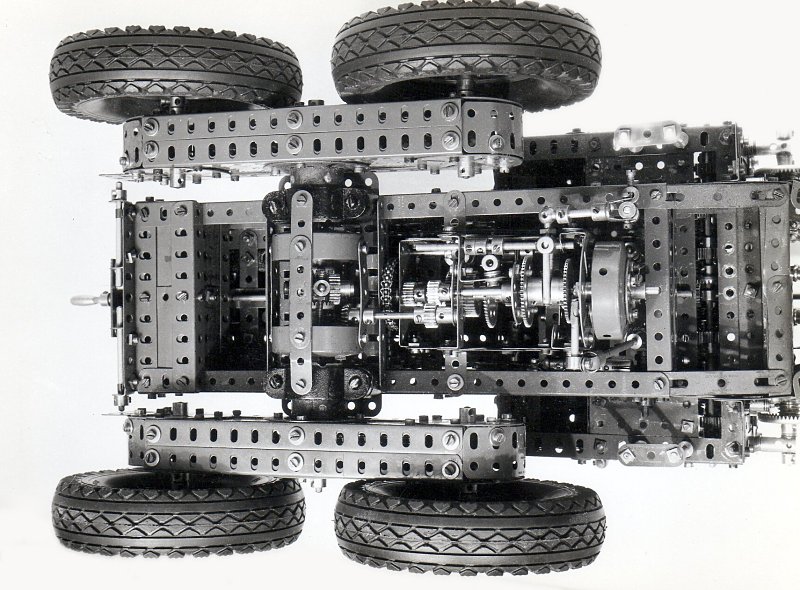 Underside view showing the main gearbox and transmission to the four-wheel tandem drive