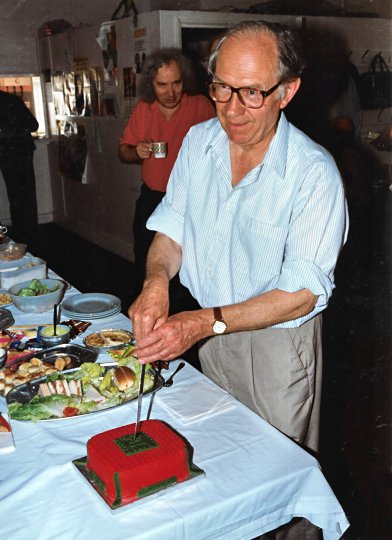 Our Chairman, Geoff Davison, cuts the cake at our 20th anniversary meeting. The cake had been provided by the wife of John Cowdery