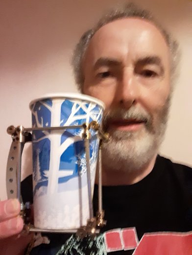 Brian Leach sports his Covid look at our first virtual meeting in March 2020
