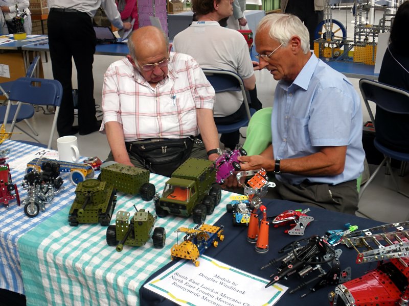 Douglas Windibank and John Gay wonder if the purple VW Beetle matches the green of the army vehicles