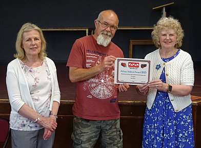 Julia Staggs presents the Award to John Clifton